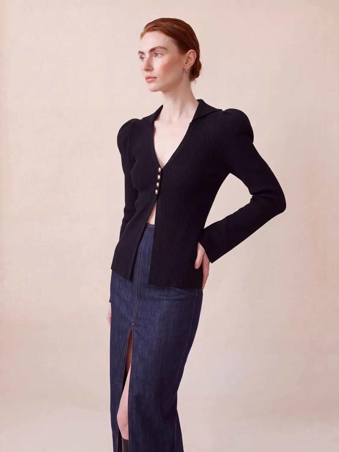 Puff Shoulder Tailored Knitted Cardigan in black ribbed knit with gold front buttons