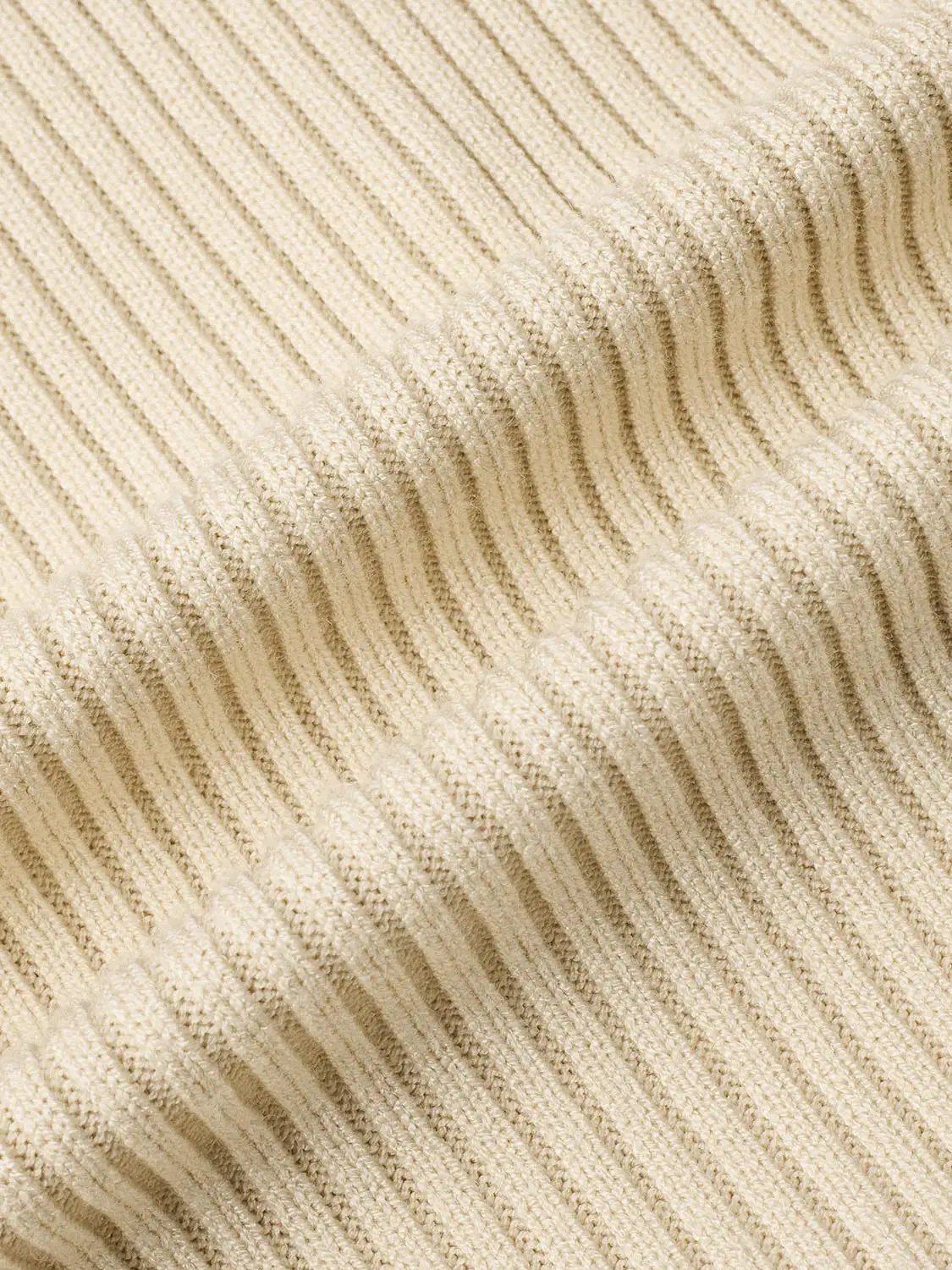 Puff Shoulder Tailored Knitted Cardigan beige ribbed knit fabric close-up