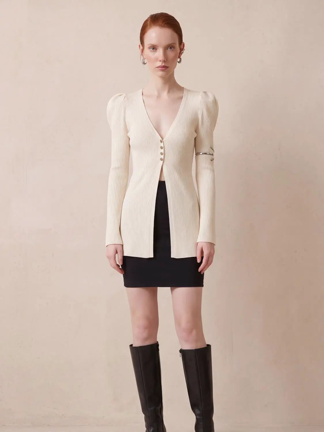 Puff Shoulder Tailored Knitted Cardigan in cream ribbed knit with front buttons.