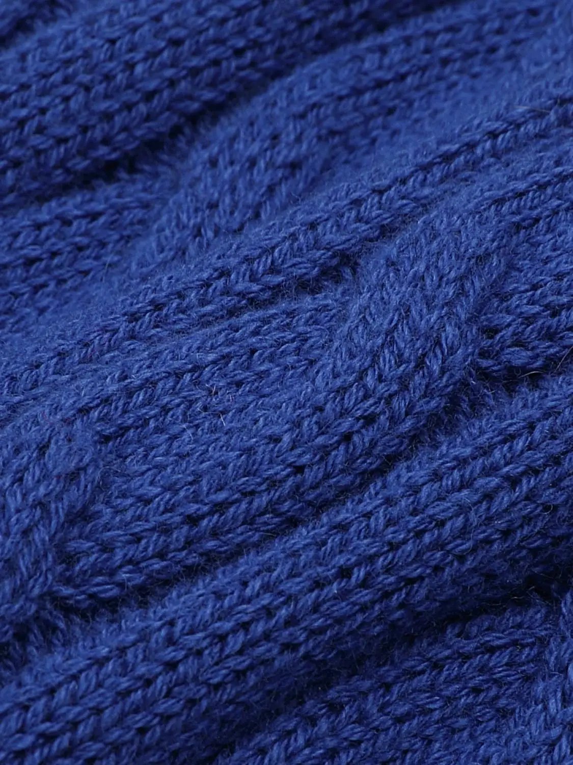 Blue cable-knit hoodie fabric in a soft cotton-wool blend.