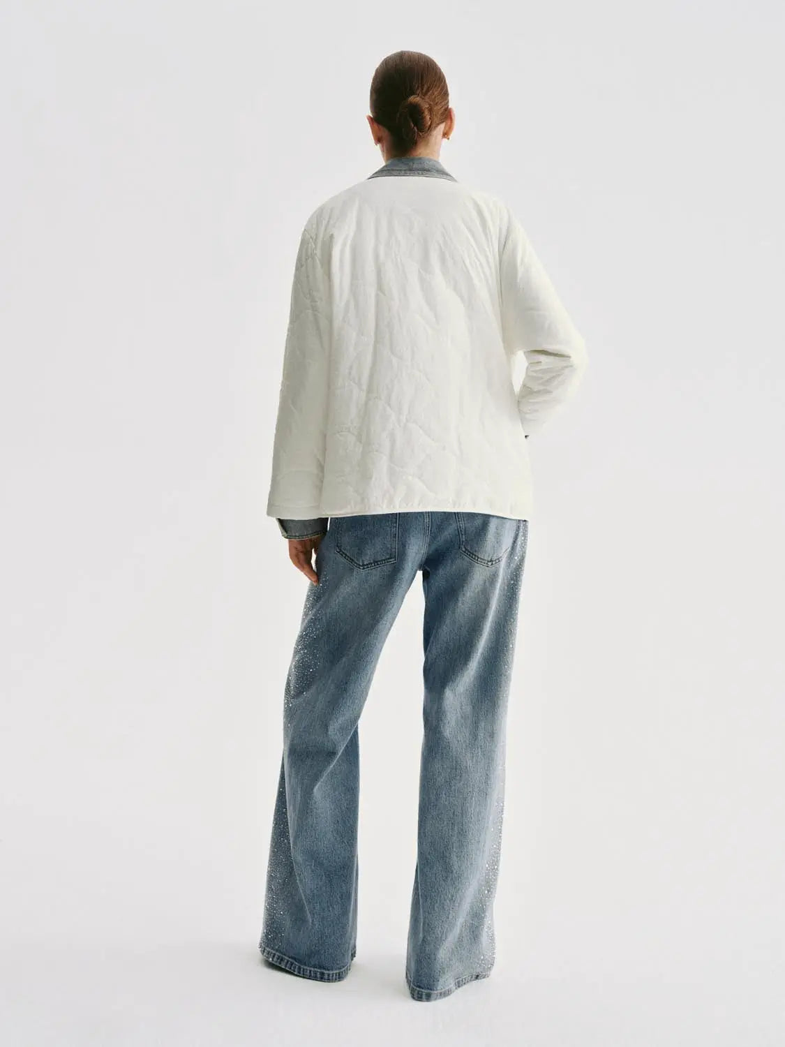 Padded Jacket UR by Urban Revivo Fashion, white quilted; two-piece outfit with blue denim jeans, back view