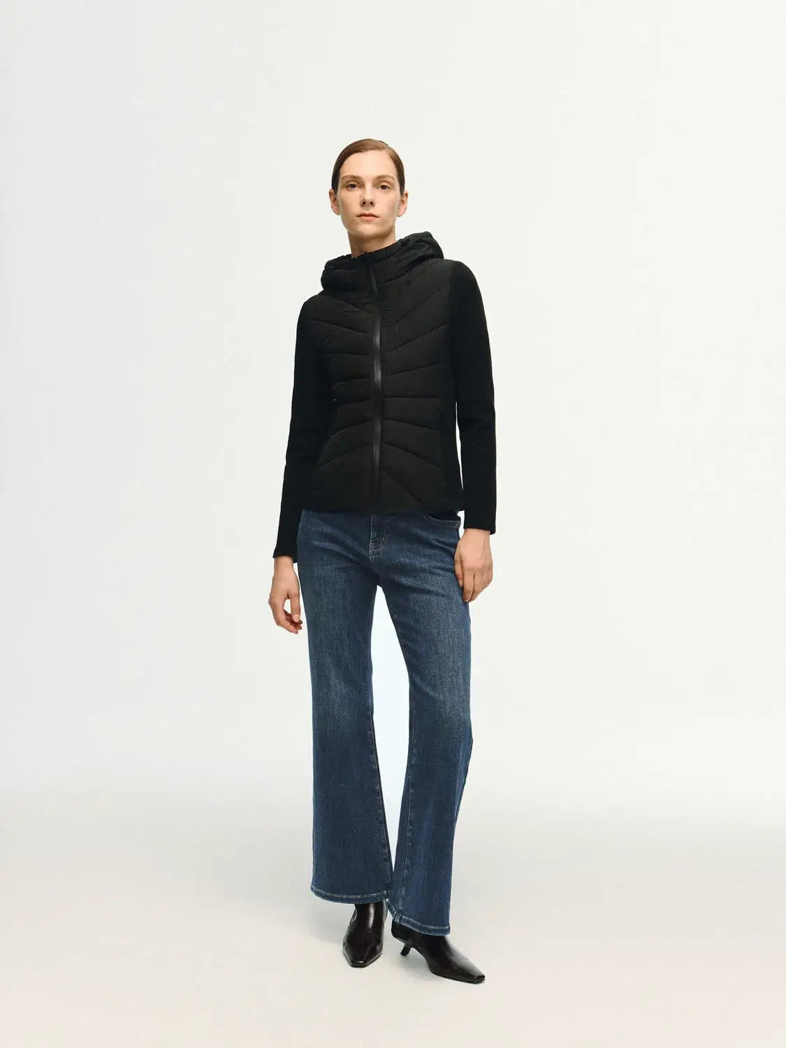 Padded jacket black with quilted front panels and hood.