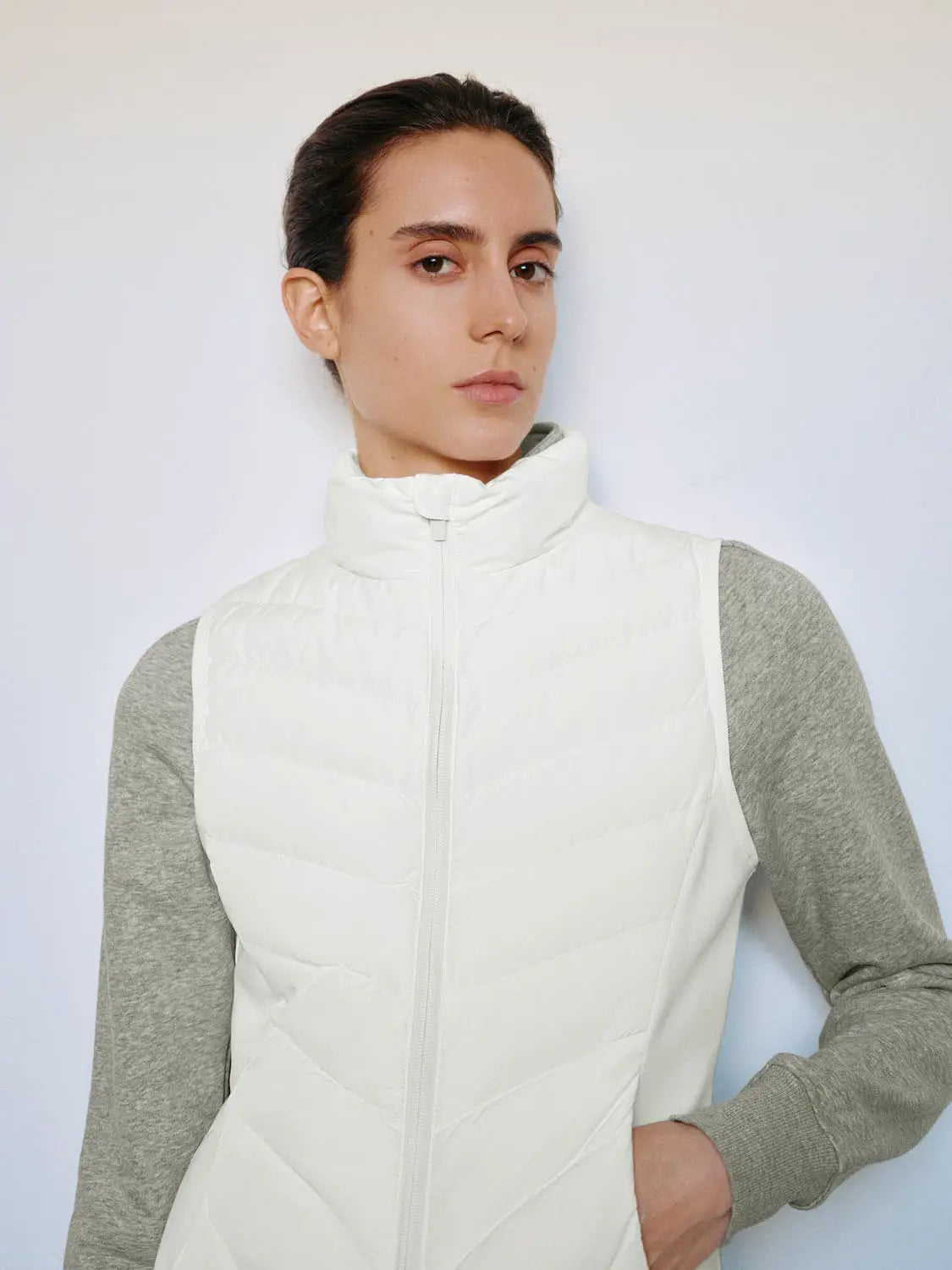 Down jacket by Urban Revivo Fashion; white quilted body with gray sleeves