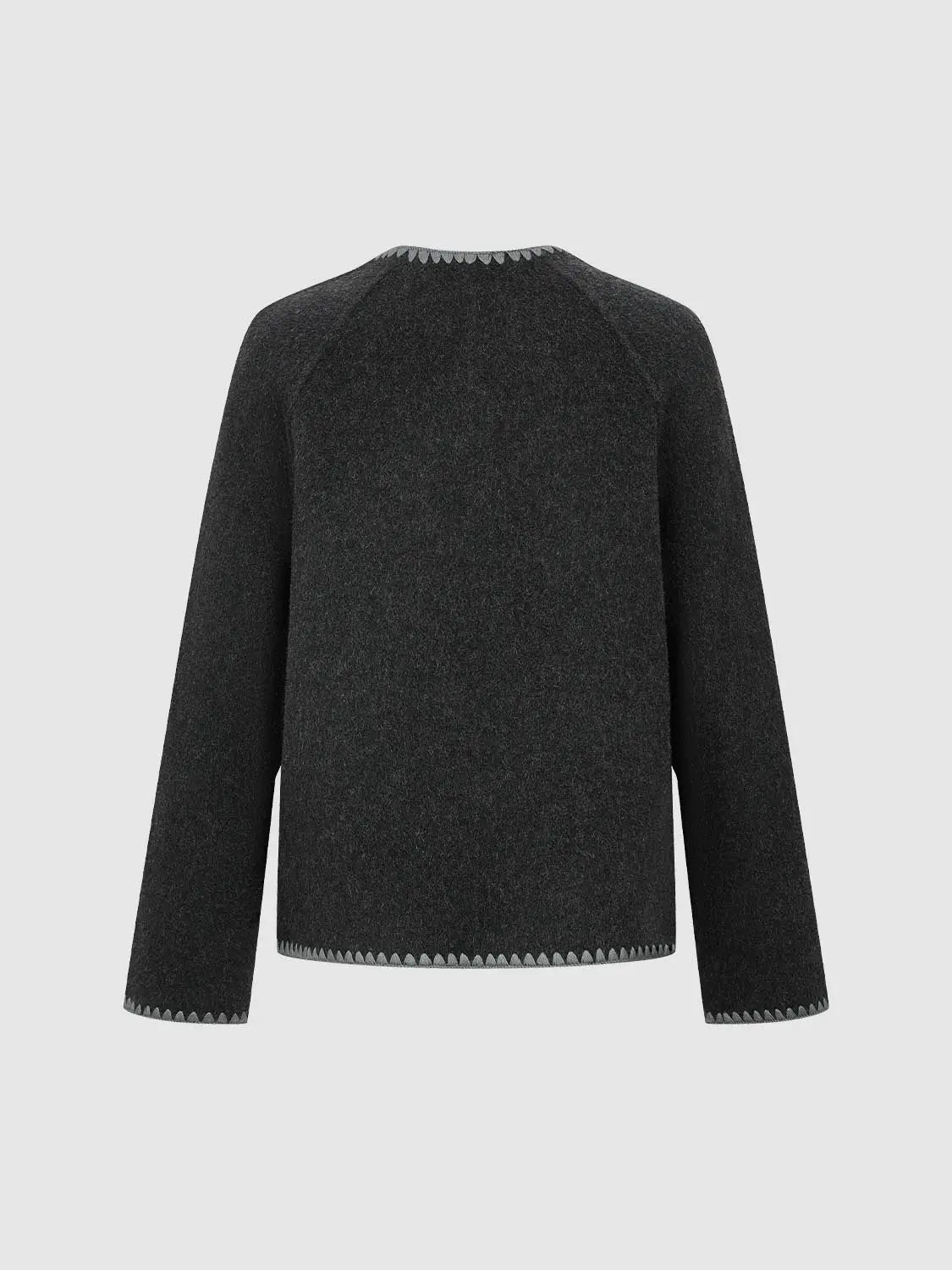 Coat, charcoal gray wool-blend with zigzag stitched hem and cuffs, back view.