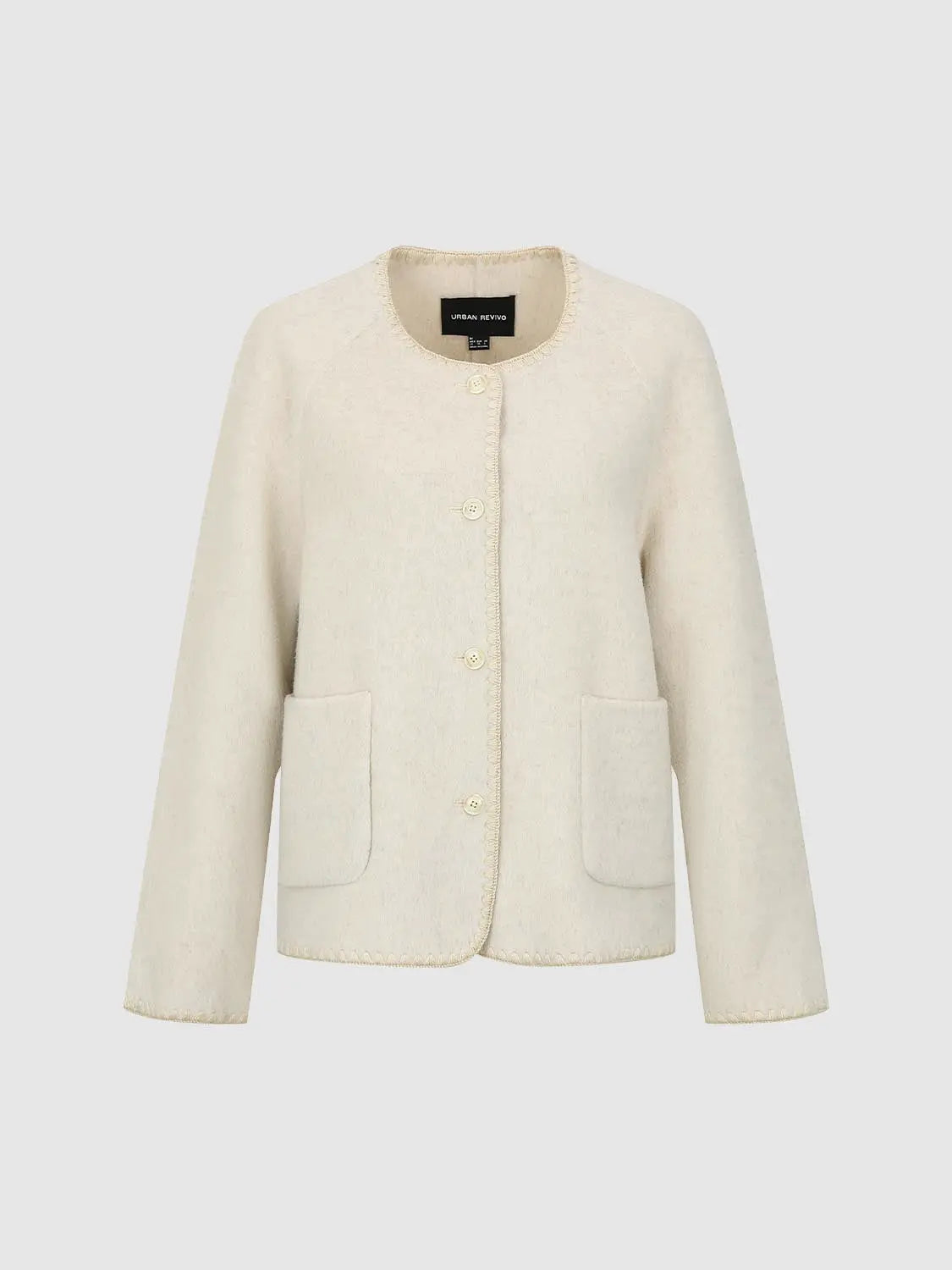 Coat in cream boucle fabric with button-front closure and large patch pockets, Urban Revivo.