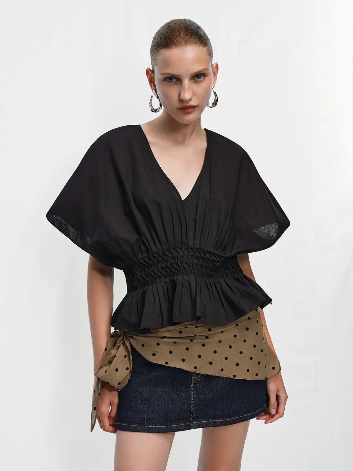 V-neck puff-sleeve smocked-waist blouse in black cotton-linen blend by Urban Revivo Fashion
