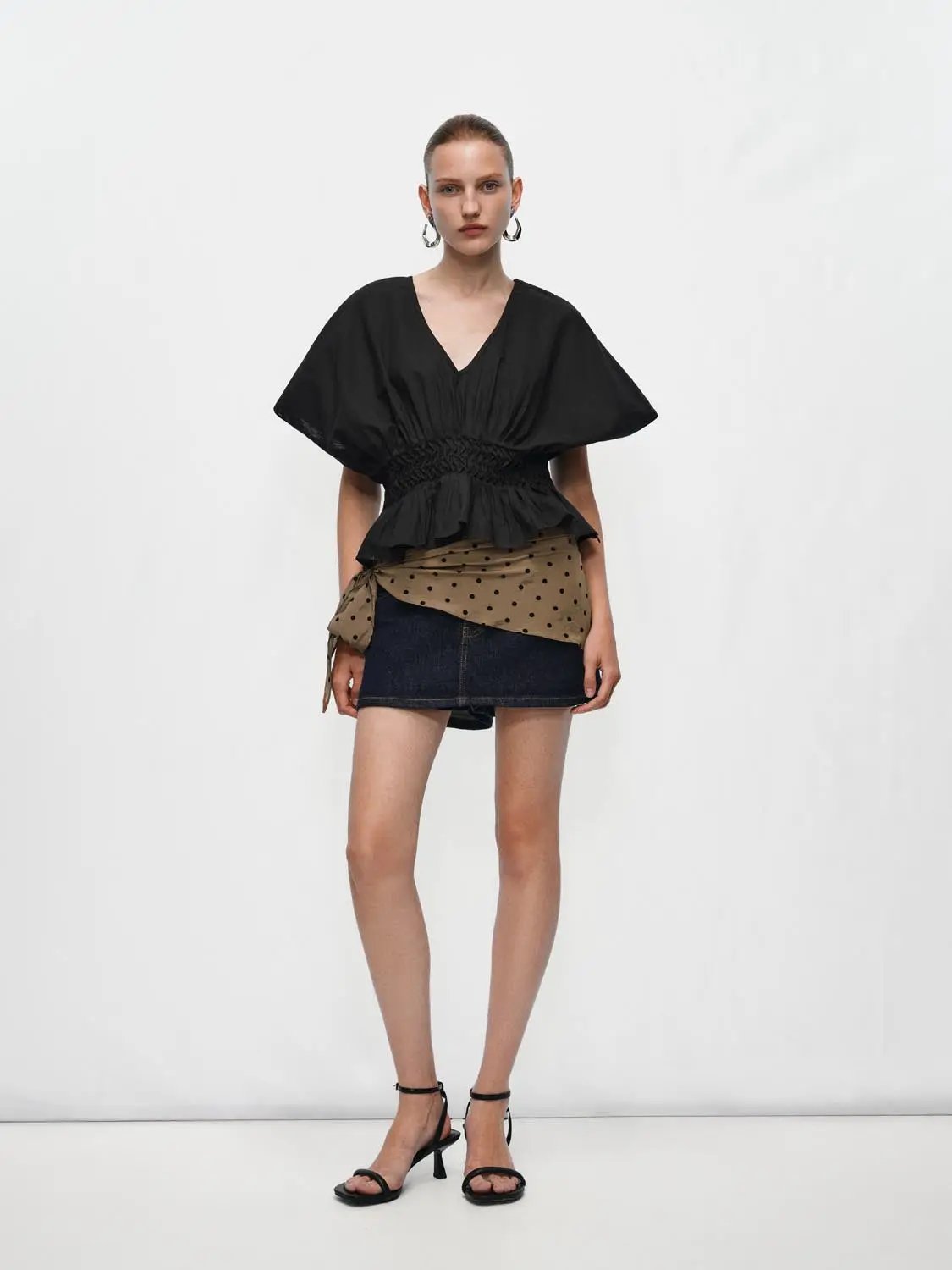 V-neck puff-sleeve smocked-waist cotton linen blend blouse in black