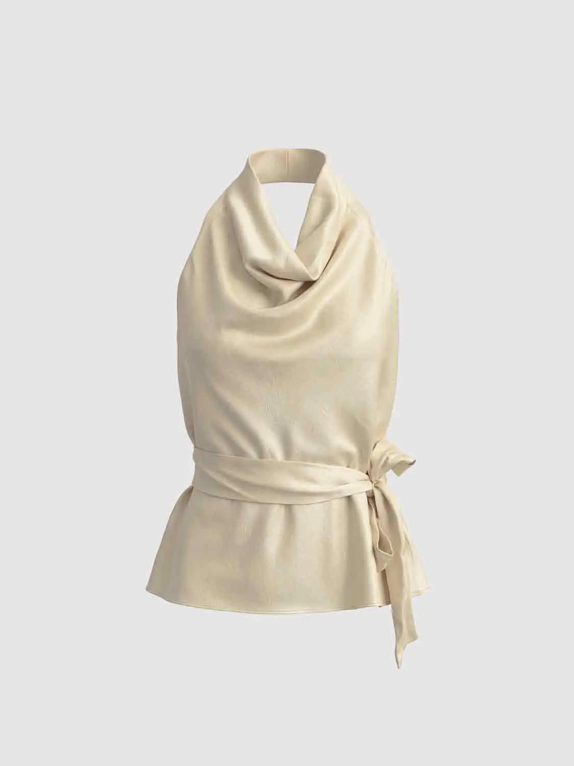 Blouse, beige wrap-style sleeveless top with draped neckline and waist tie.