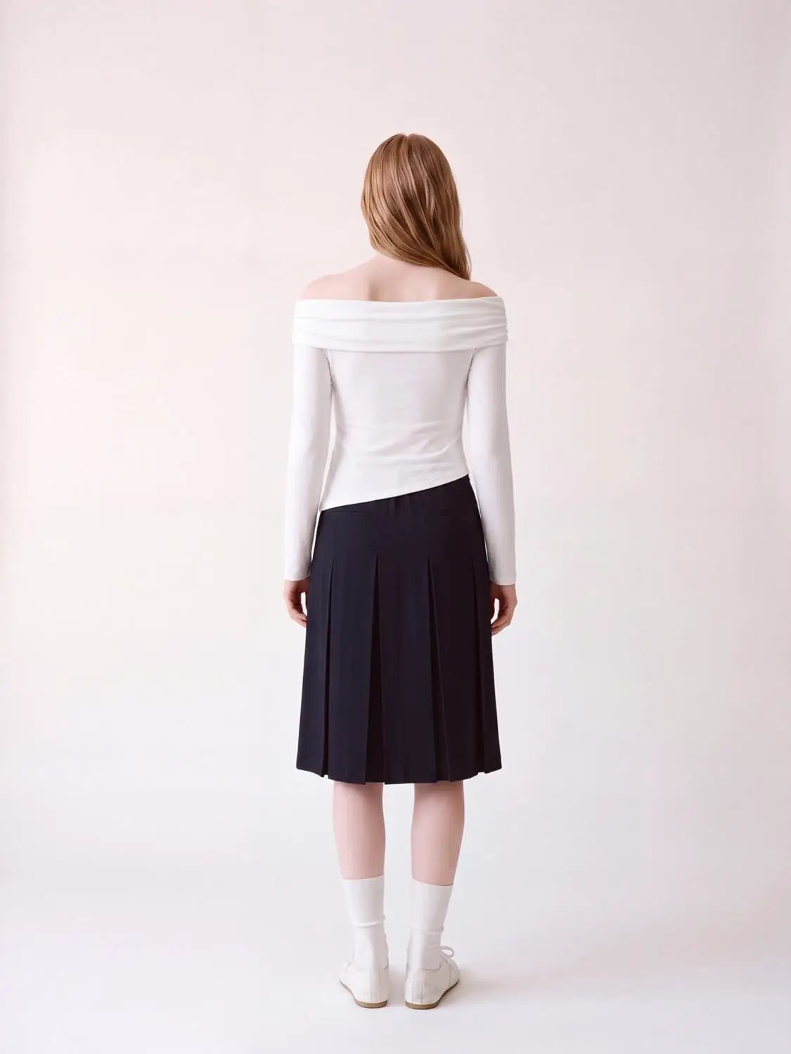 Off Shoulder Long Sleeve T-Shirts; white off-shoulder top paired with black pleated midi skirt