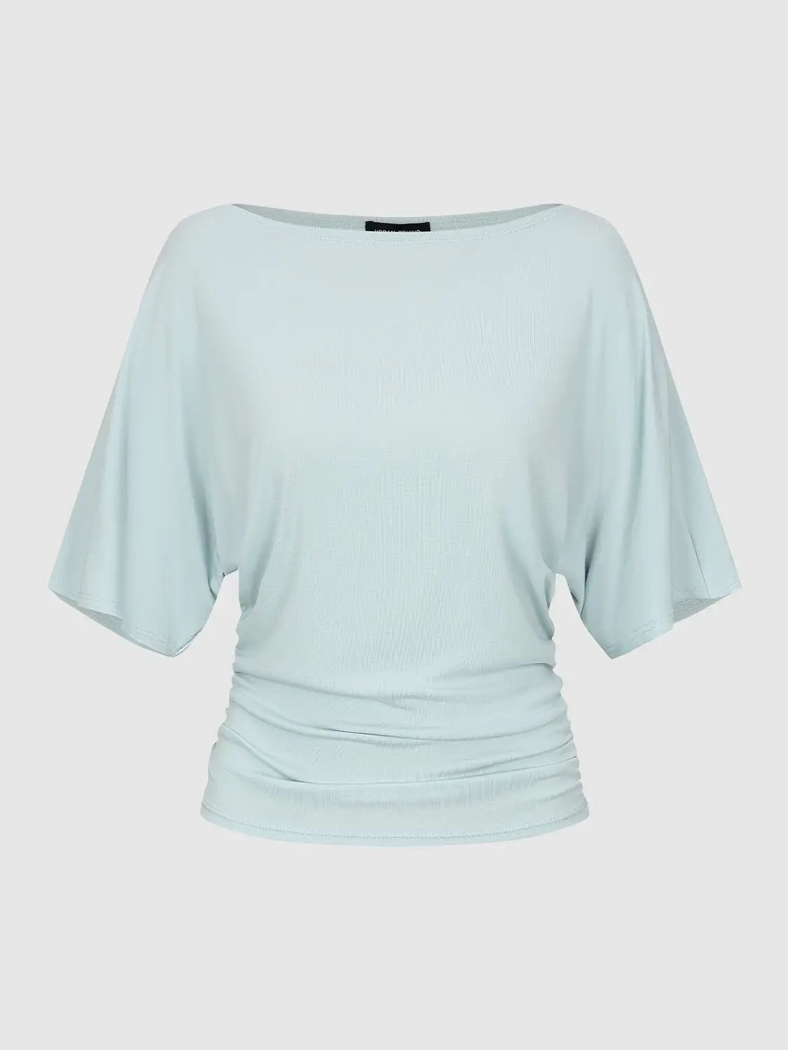 Draped short sleeve ruched-waist T-shirt in pale blue.