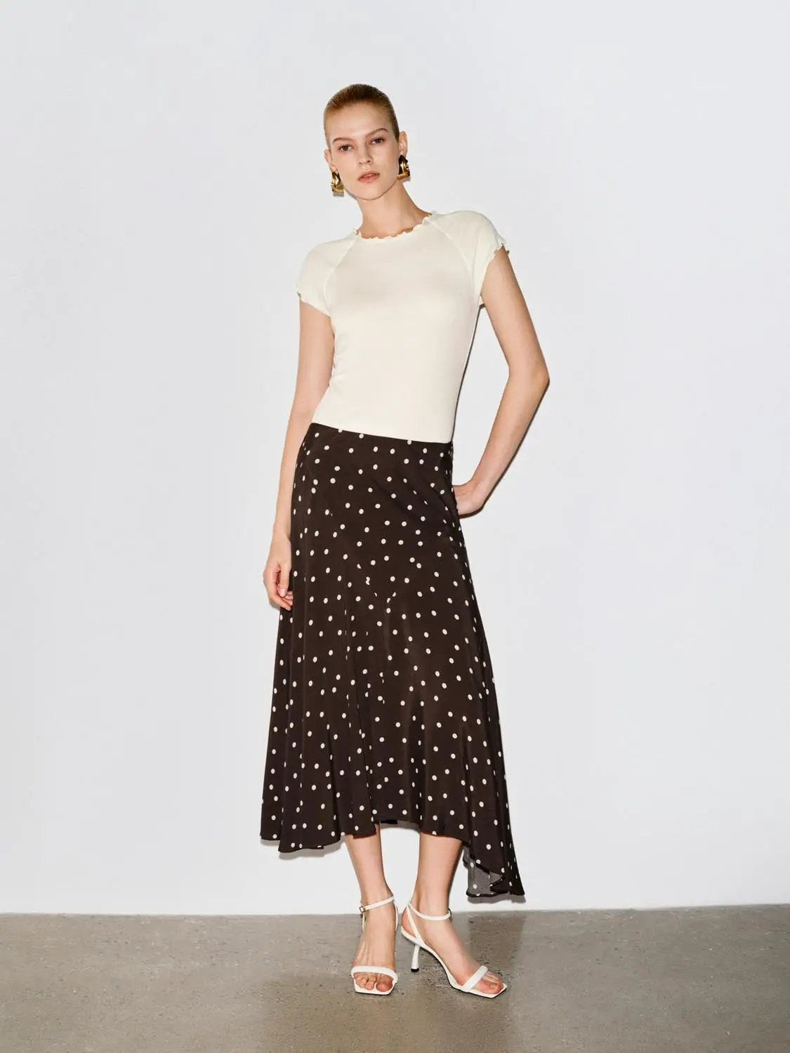 Polka Dot Asymmetric Hem Maxi Wrap Skirt by Urban Revivo Fashion; brown with white polka dots.