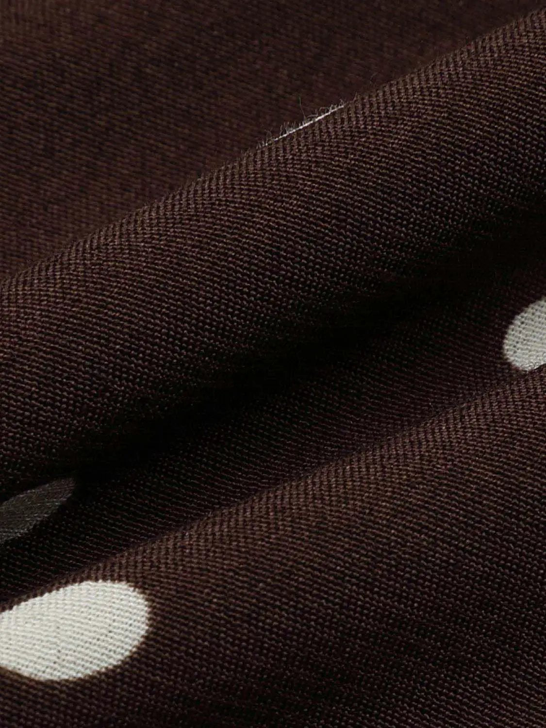 Polka dot asymmetric-hem maxi wrap skirt in brown with white dots
