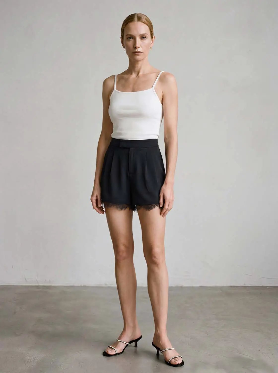 Lace Trim Shorts; black, high-waisted with delicate lace hem