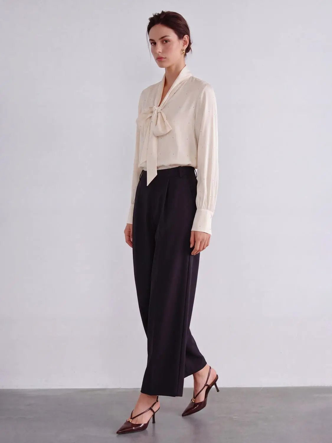 Wide-leg pants in black with a clean tailored silhouette.