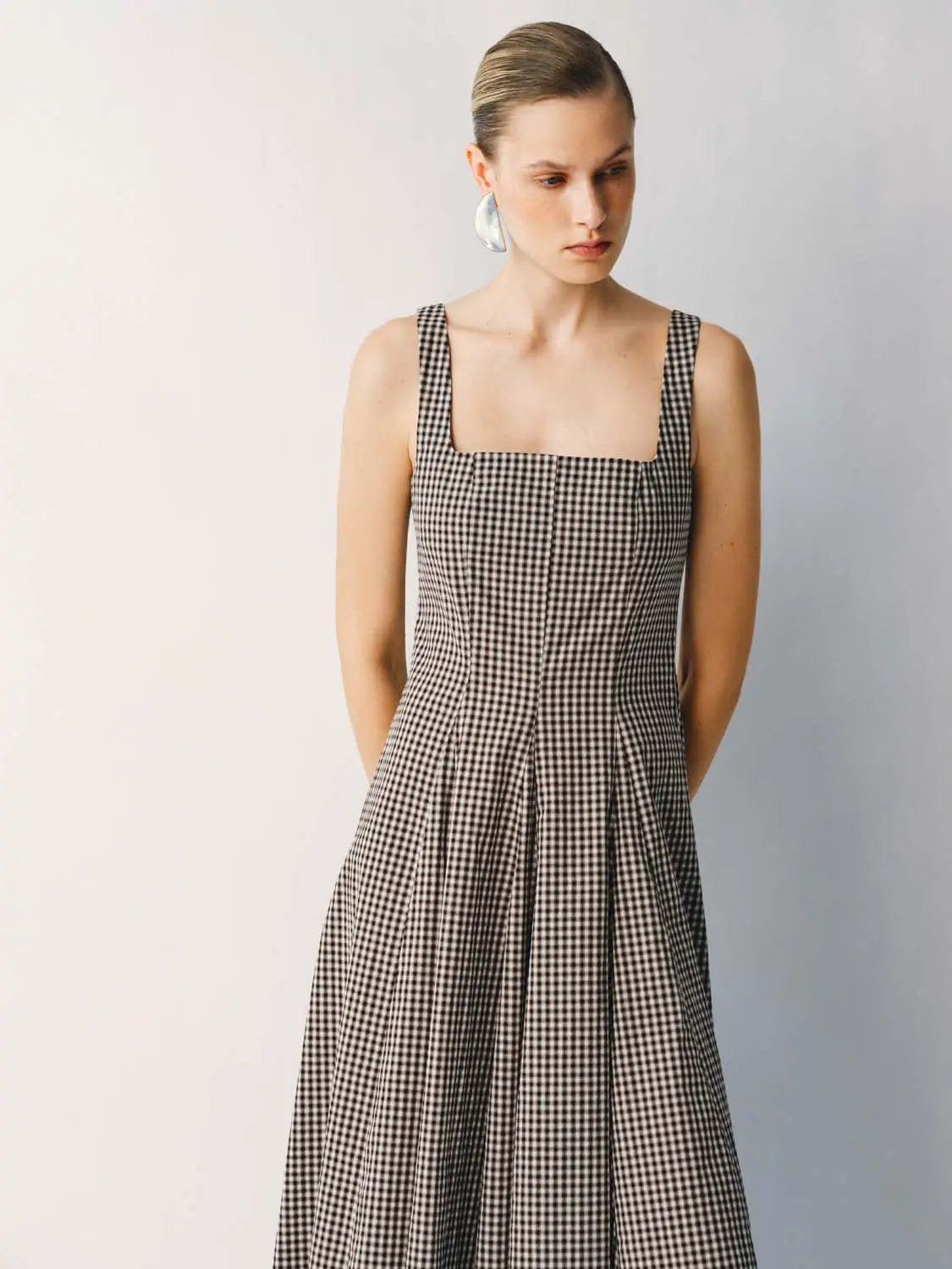 Cotton gingham textured weave strappy A-line maxi dress in black and white checks, worn by model.