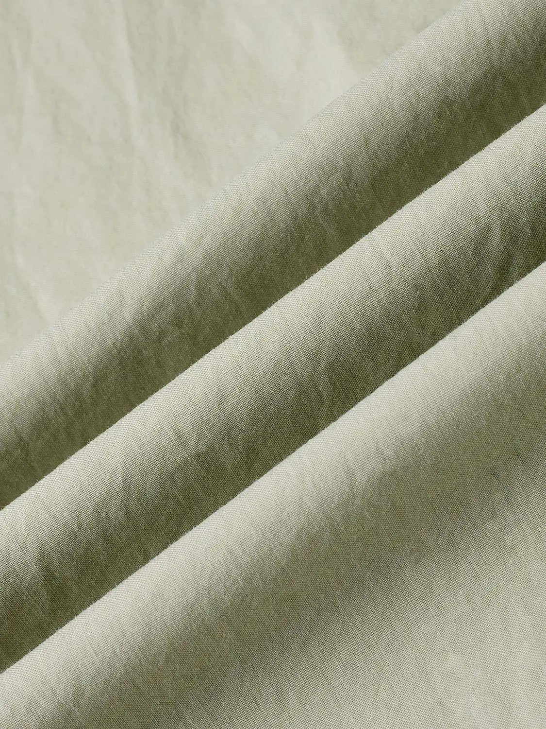 Thin Stretch Fabric Strappy A-Line Midi Dress beige fabric close-up