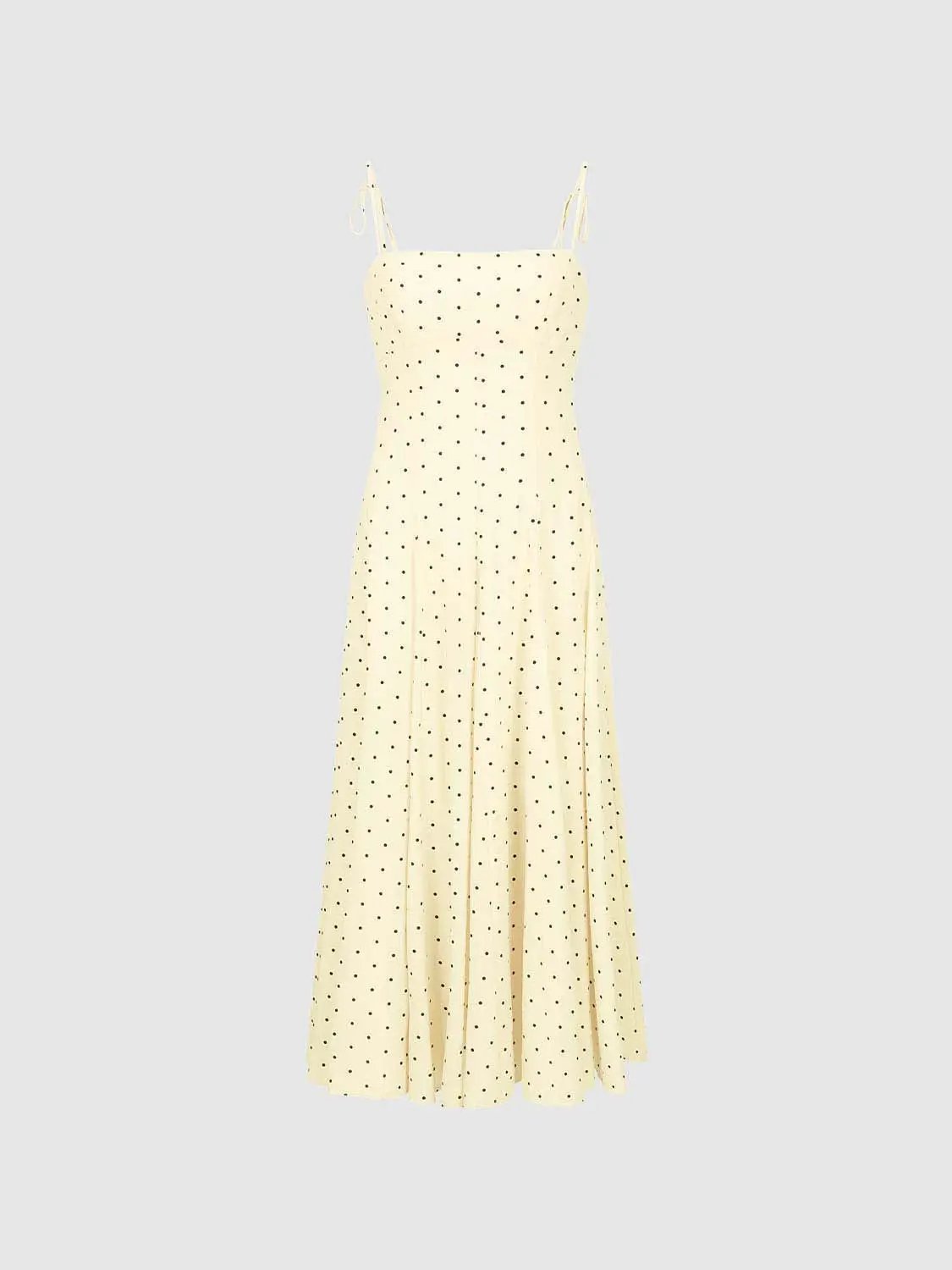 Polka Dot A-Line Dress in pale cream with small black dots and spaghetti straps