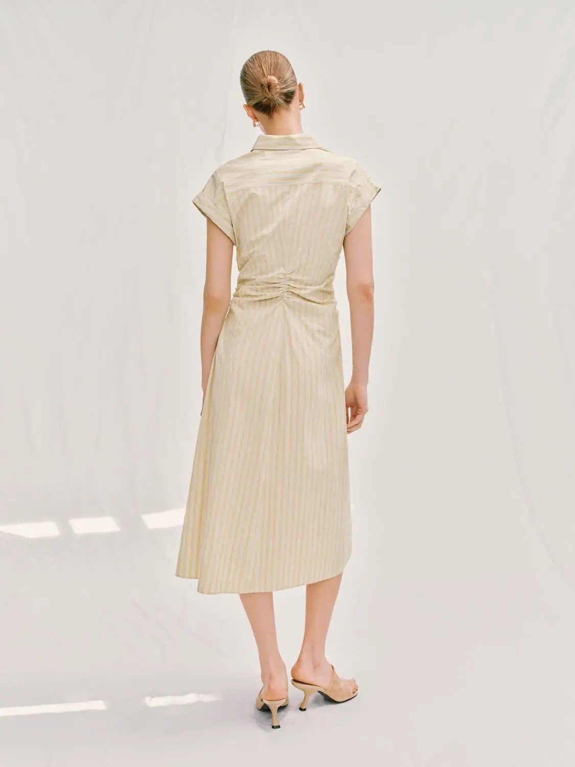 A-Line Dress by Urban Revivo Fashion; beige striped fabric, back view.