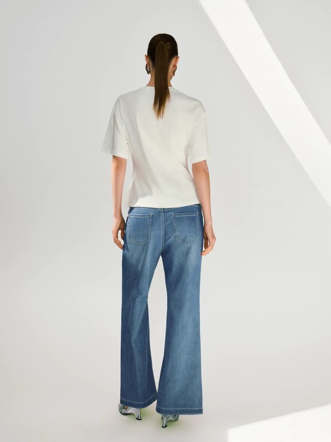 Wide-leg cotton-blend jeans with subtle wash in blue denim