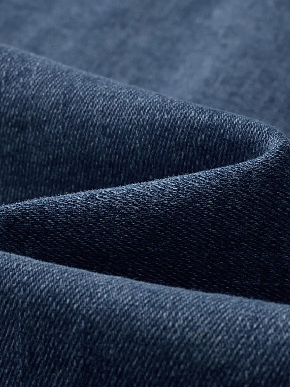 Denim dress by Urban Revivo Fashion; blue denim fabric close-up texture.
