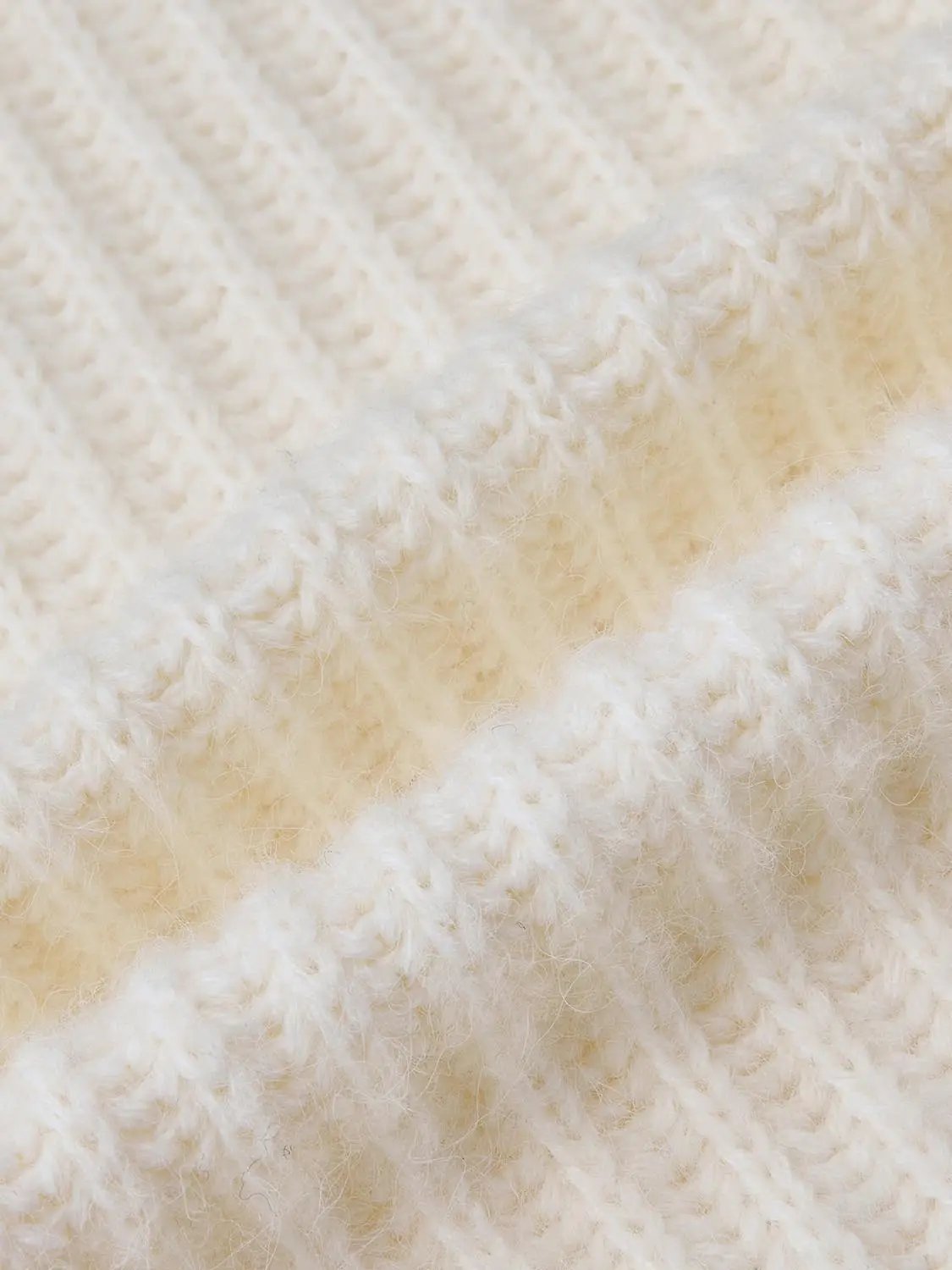 High Neck Long Sleeve Knitted T-Shirts in ivory cream knit fabric; close-up shows soft, textured ribbed yarn