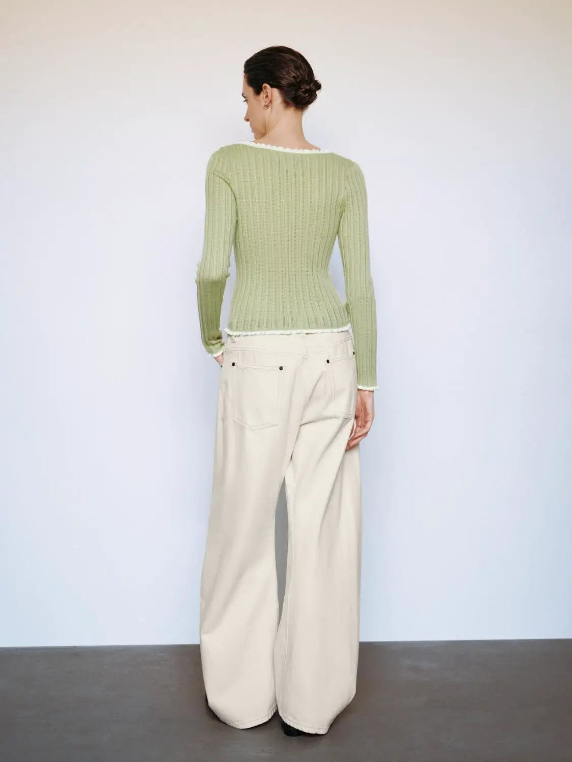 Ribbed knit long-sleeve T-shirt in sage green with white trim at neckline and hem, Urban Revivo.