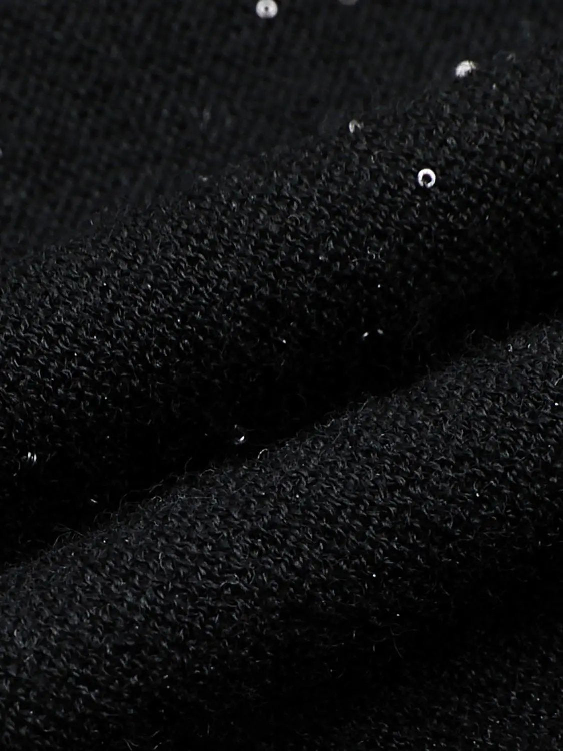 Knit T-Shirt in black knitted fabric with tiny white specks.