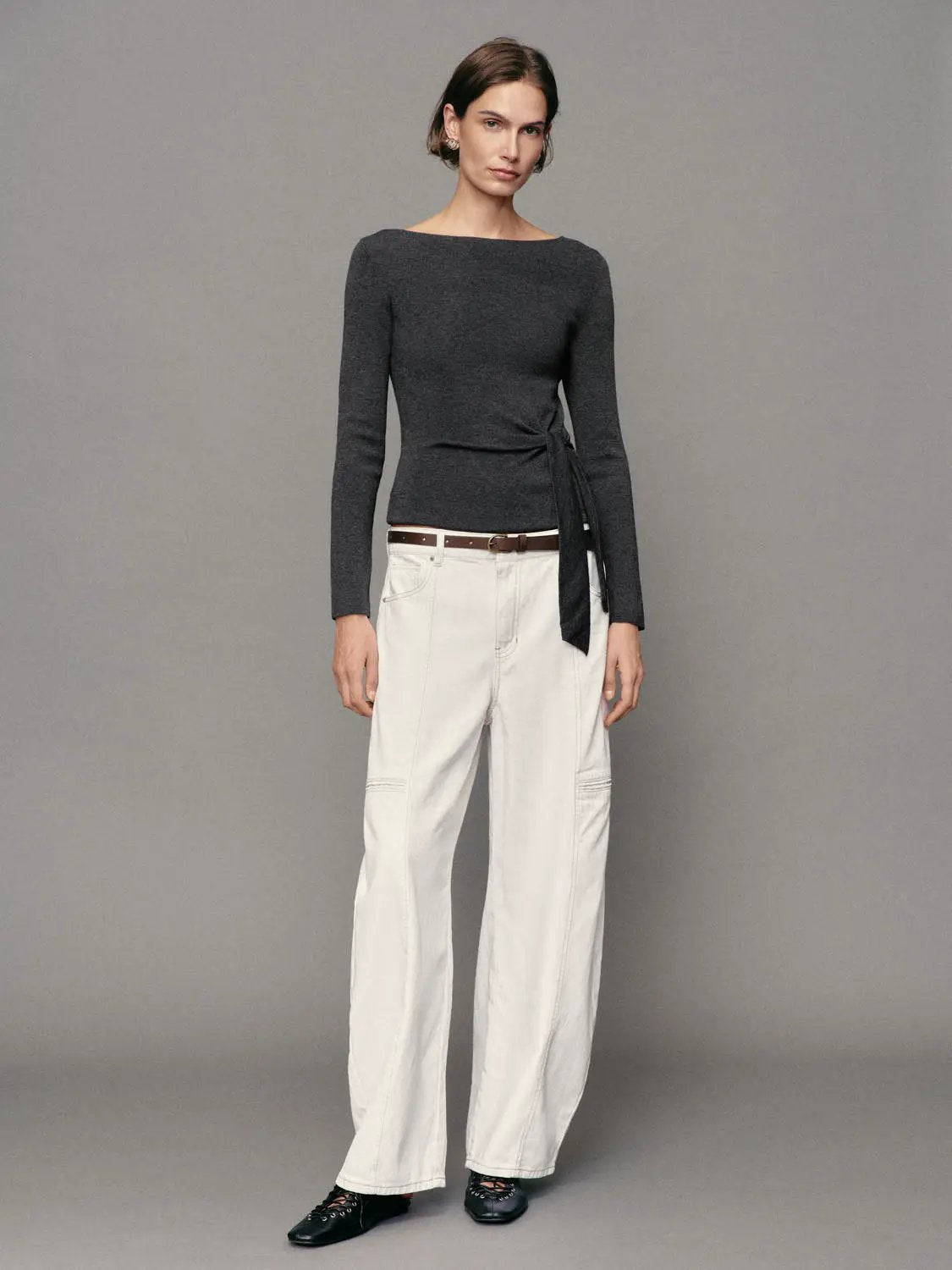 Ribbed long-sleeve boat-neck knit top in dark gray with a tie-waist wrap detail
