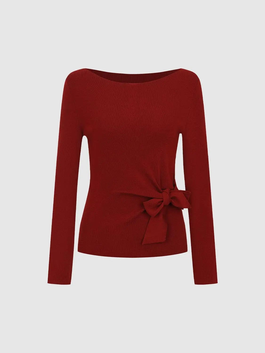 Ribbed long-sleeve boat-neck knit top in red with a waist bow.