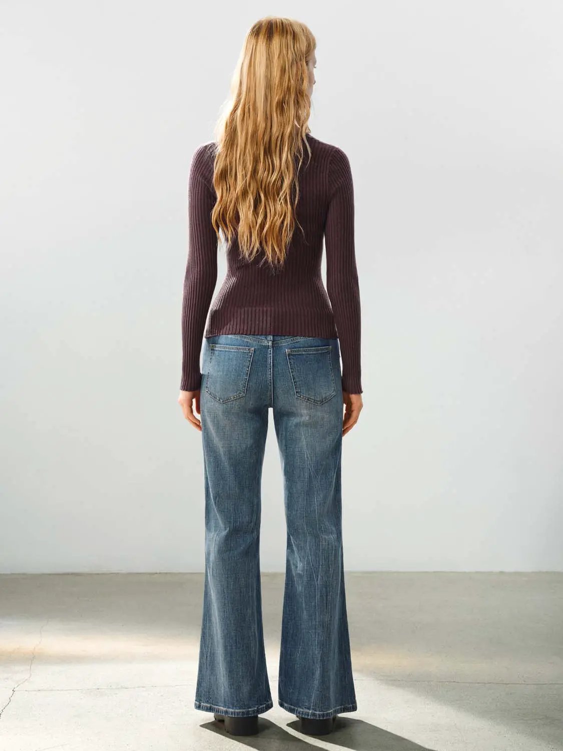 Fitted ribbed knit long-sleeve cardigan in burgundy with blue denim jeans 2-piece outfit