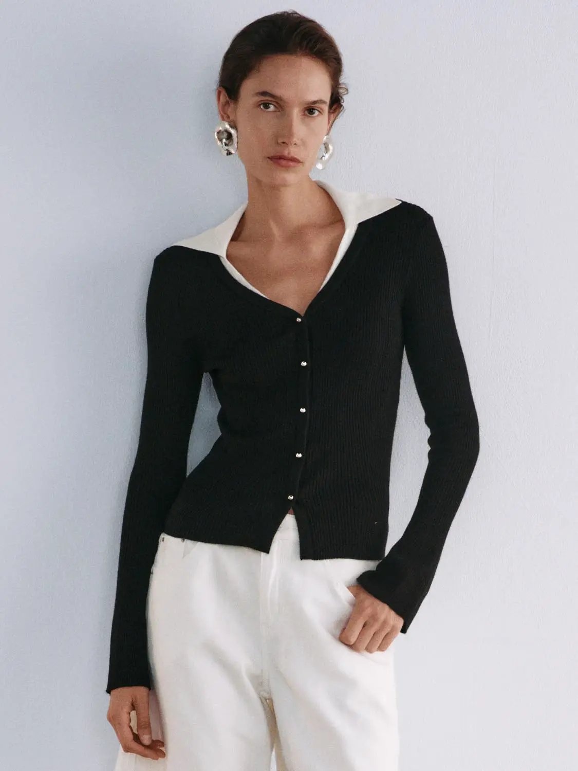 Knitted cardigan, black with white collar detail and metal front buttons