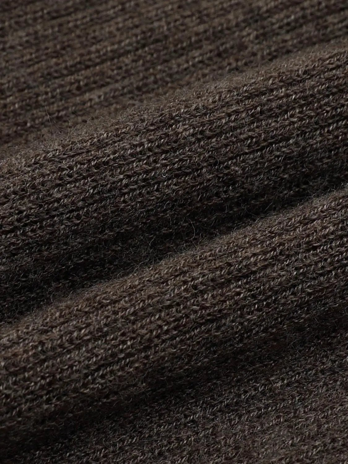 Ribbed knit jacket, dark brown, close-up of textured fabric
