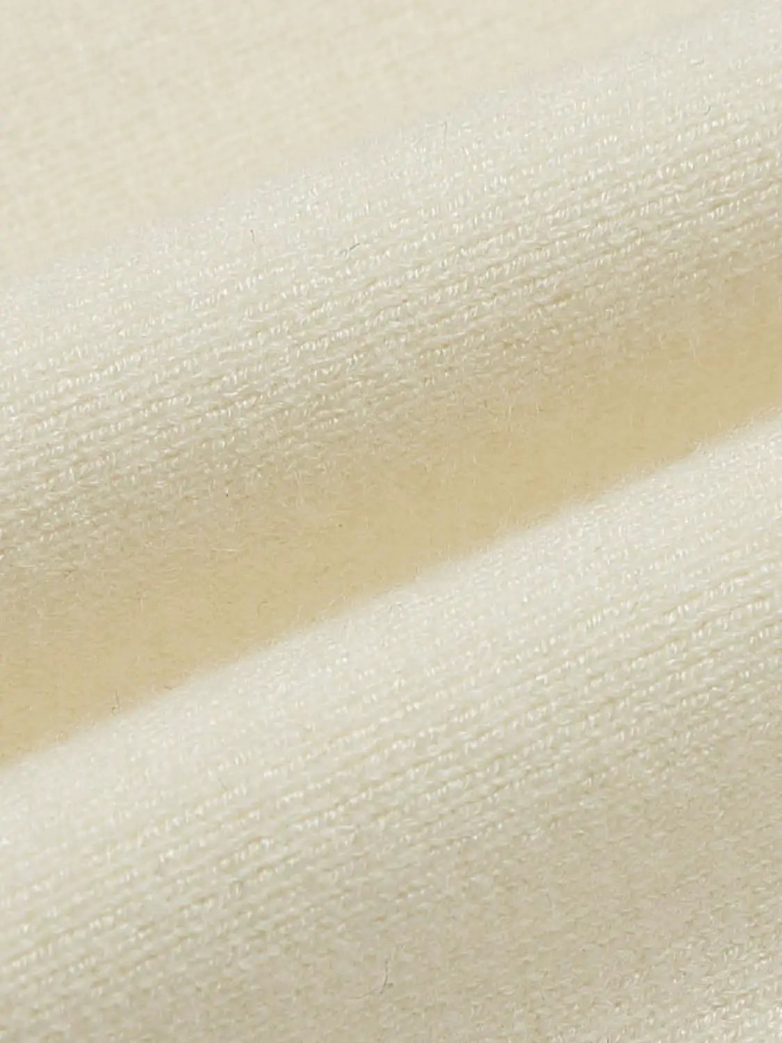 Ribbed button-front cardigan in ivory knit fabric, soft feel.