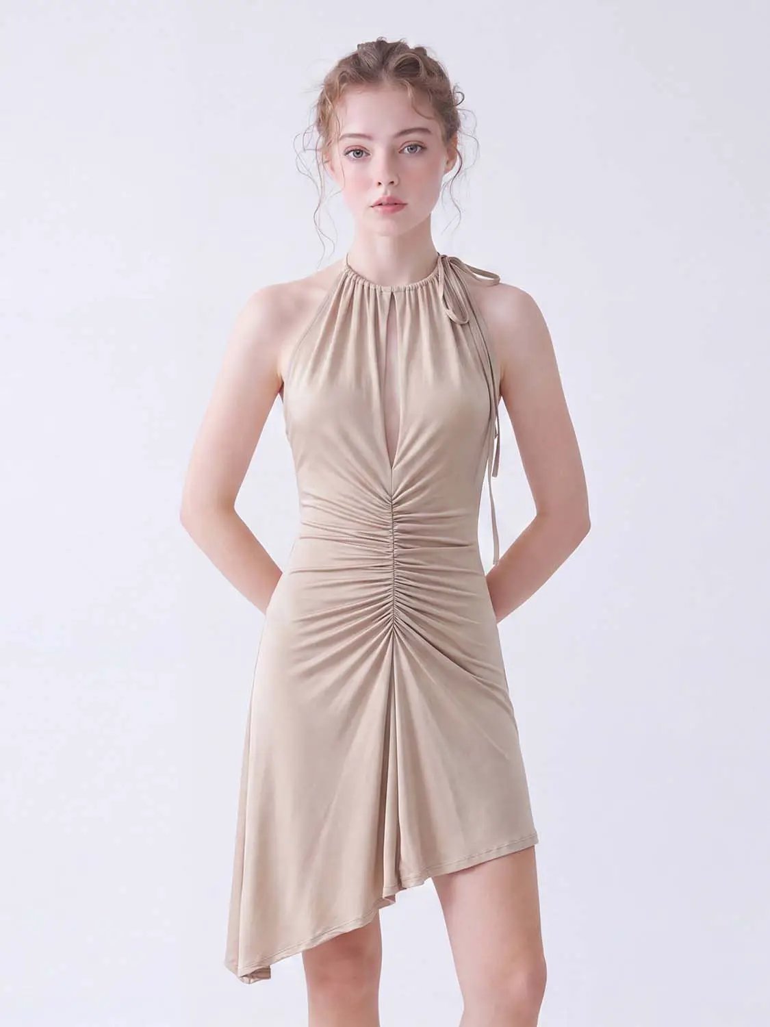 A-line dress in beige satin with halter neck and front ruching.