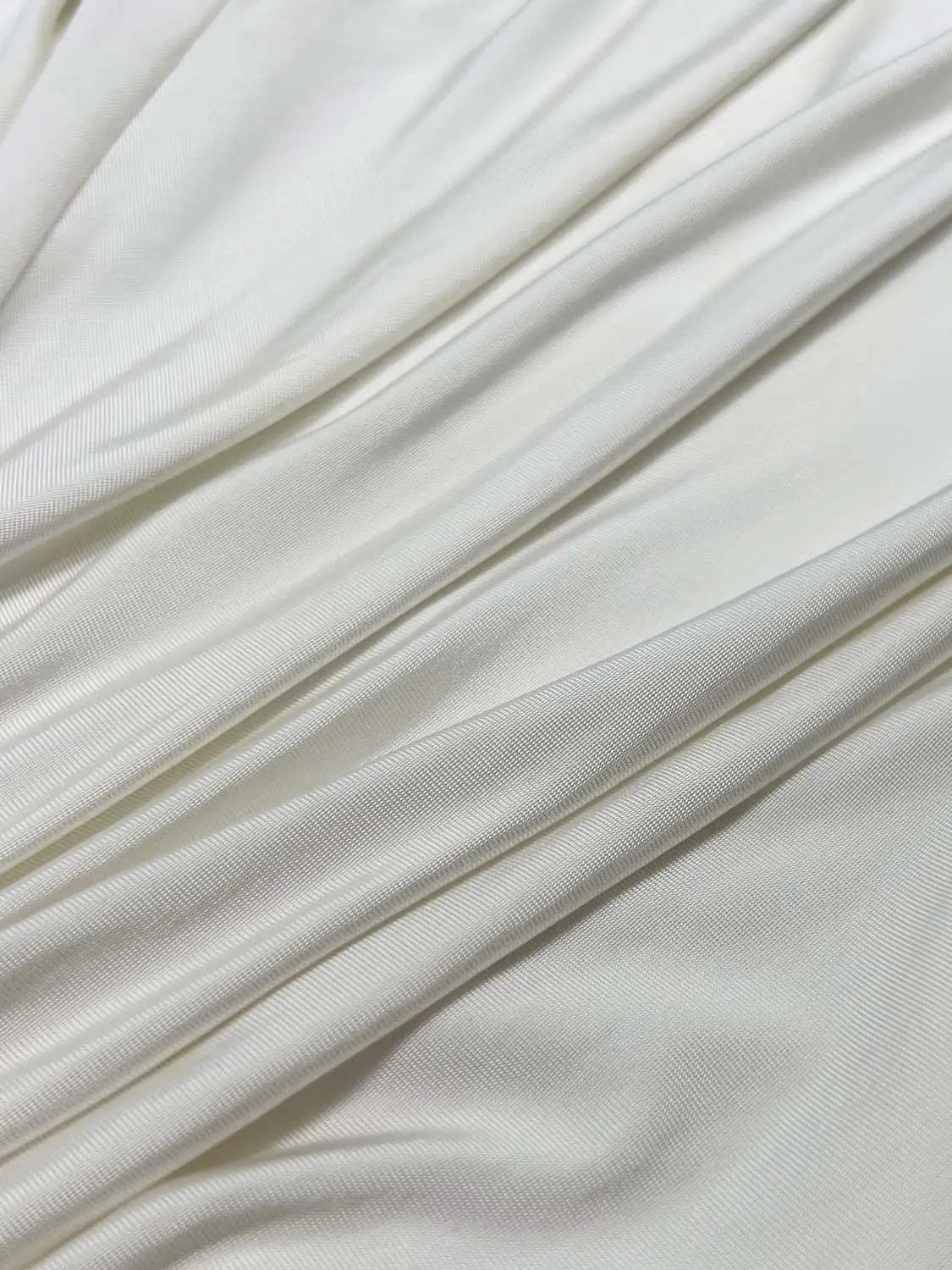 A-Line dresses in white satin fabric with diagonal folds by Urban Revivo Fashion