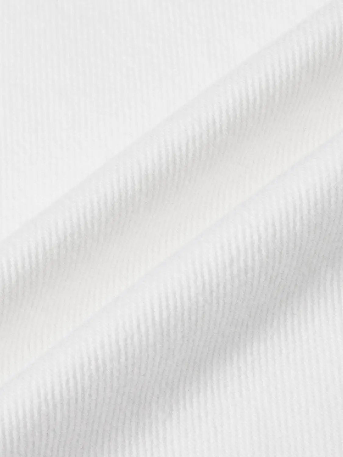 Jeans white cotton denim fabric close-up showing texture