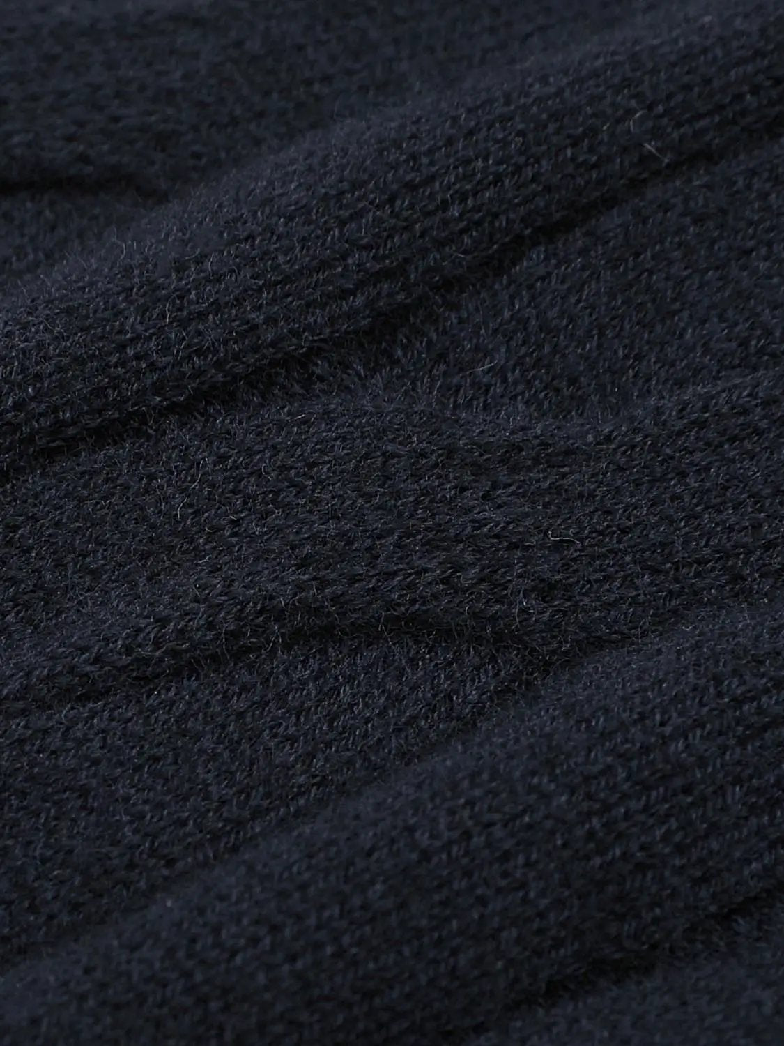 Knitted T-Shirts navy fabric close-up texture showing soft fibers