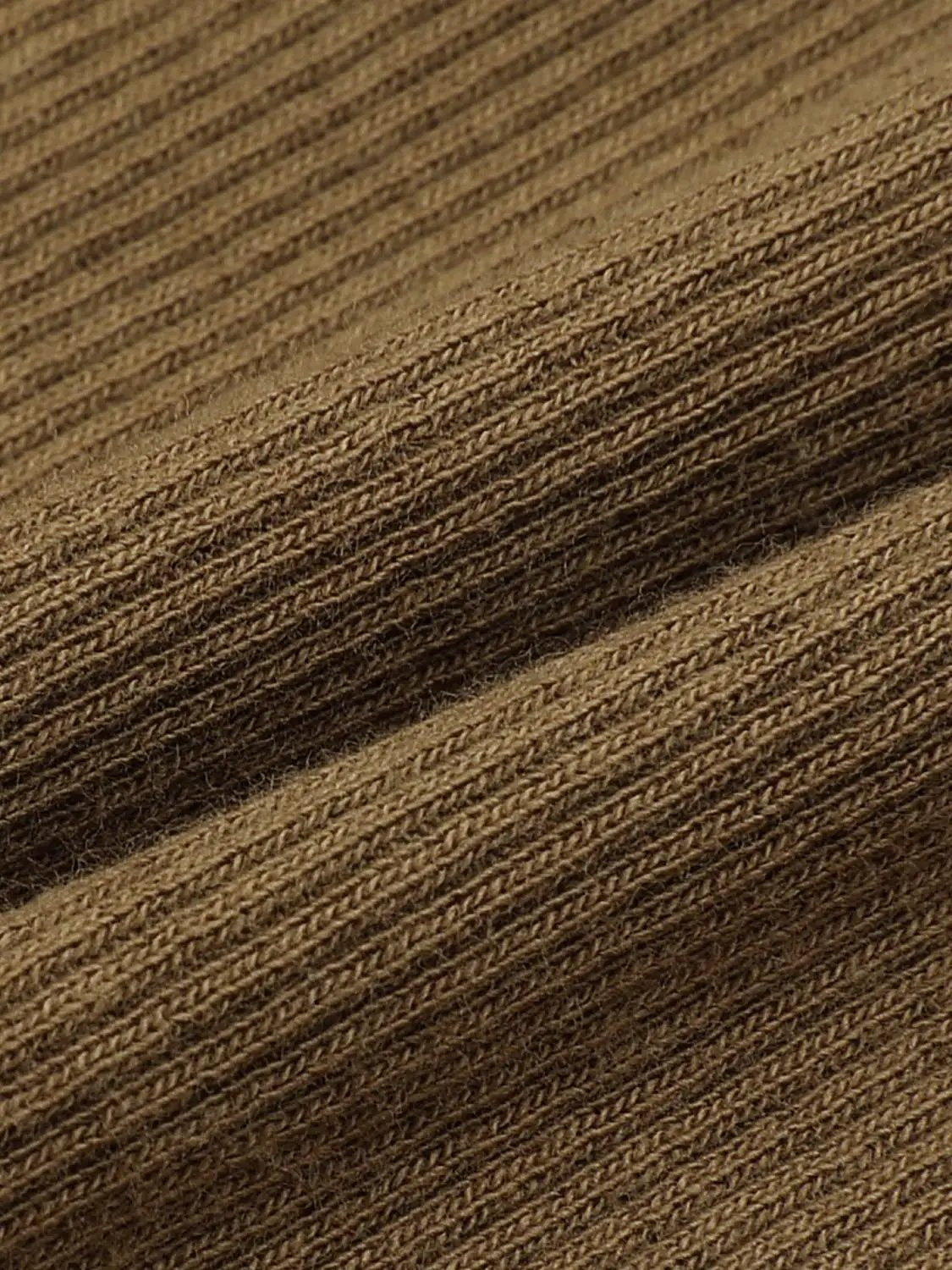 T-Shirt fabric close-up in brown ribbed-knit texture