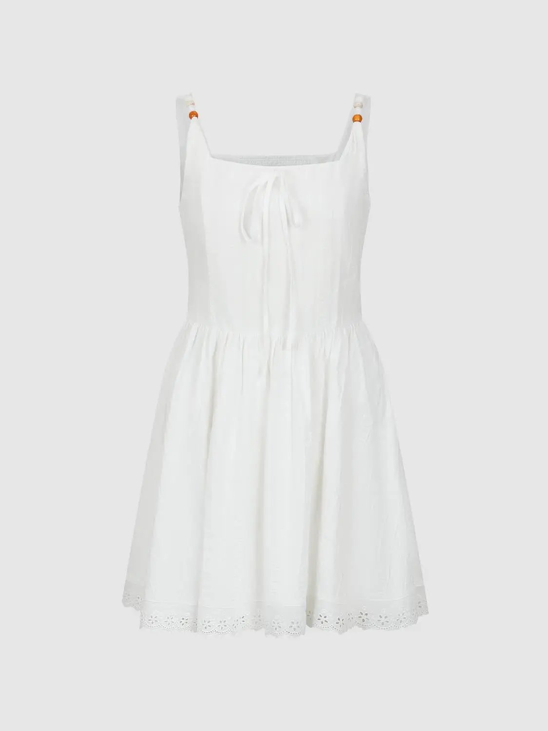 Cotton Lace Dress by Urban Revivo Fashion, white sleeveless dress with tie-front, elastic waist and eyelet lace hem.