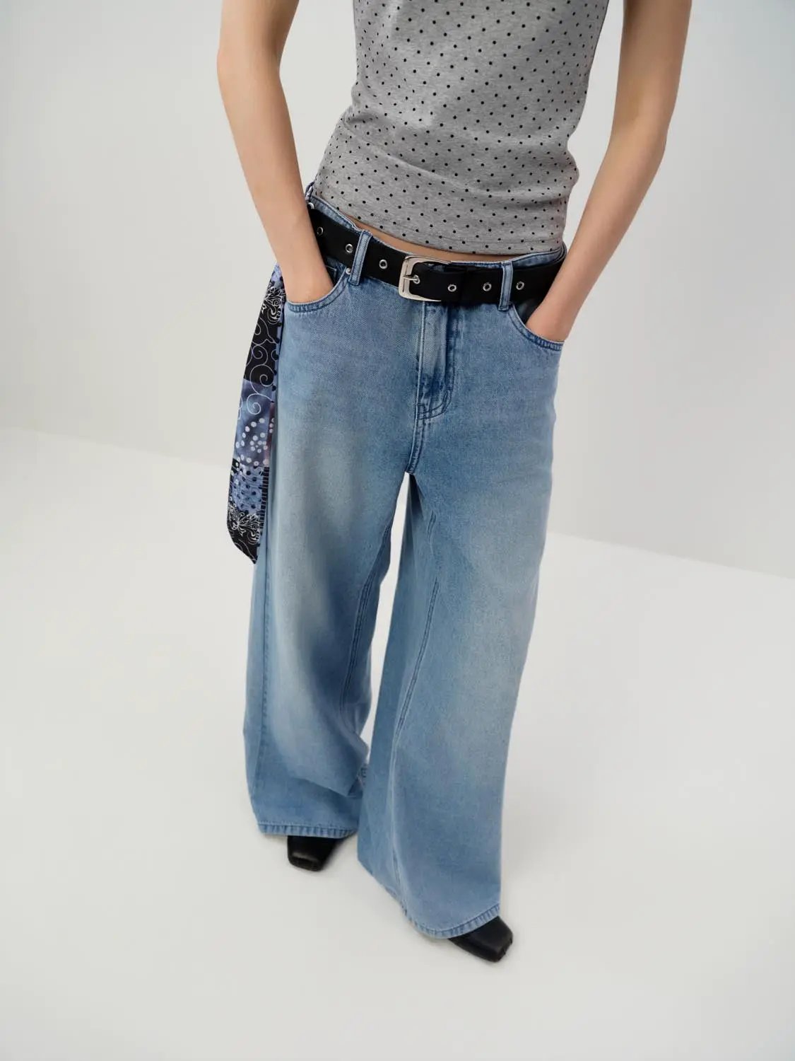 Wide-leg cotton jeans in light-wash blue with decorative patch detail