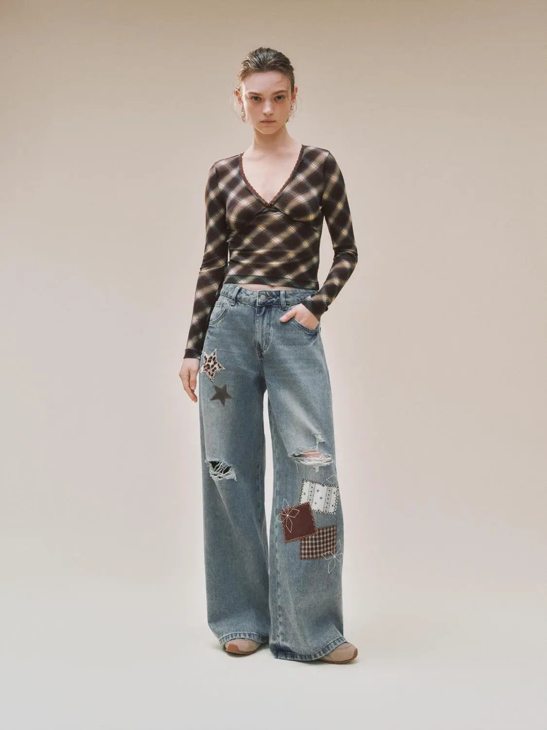 Patchwork ripped wide-leg low-rise cotton jeans in light blue with star patches and patchwork fabric patches