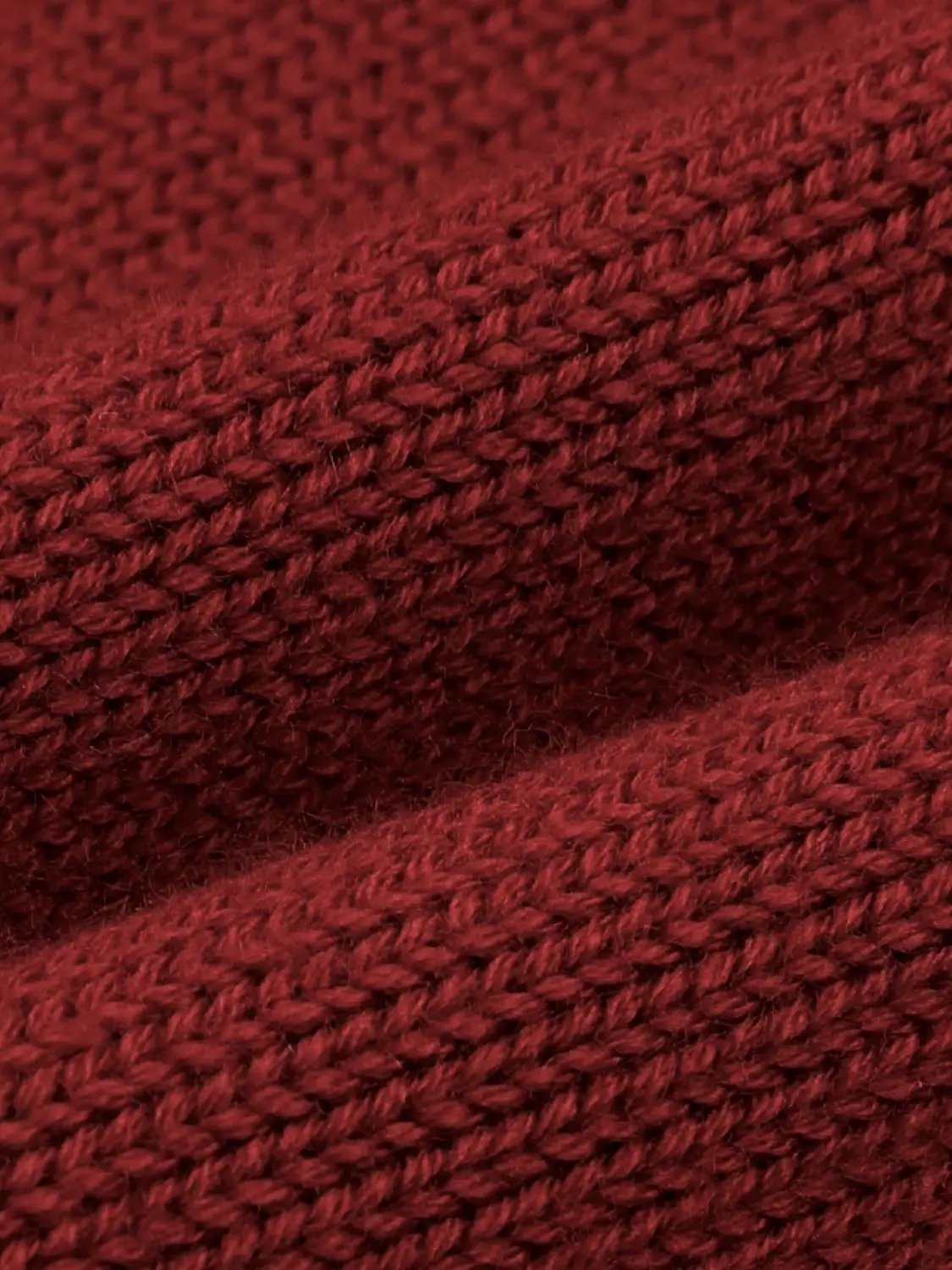 Knitwear T-shirt burgundy red knitted fabric with close-up texture