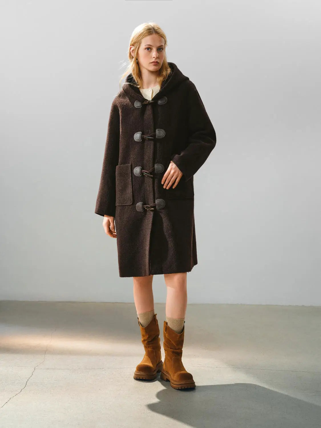 Coat by Urban Revivo Fashion; dark brown duffle-style with toggle closures and front pockets.