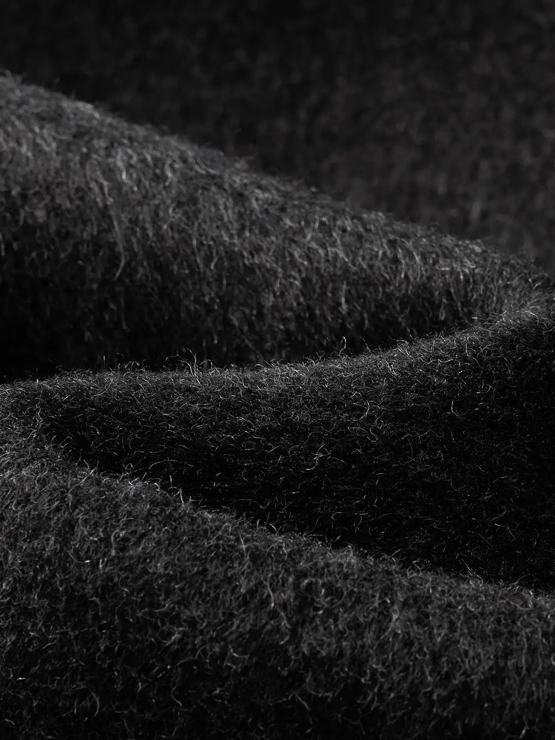 Coat fabric close-up in black wool, fuzzy texture by Urban Revivo Fashion