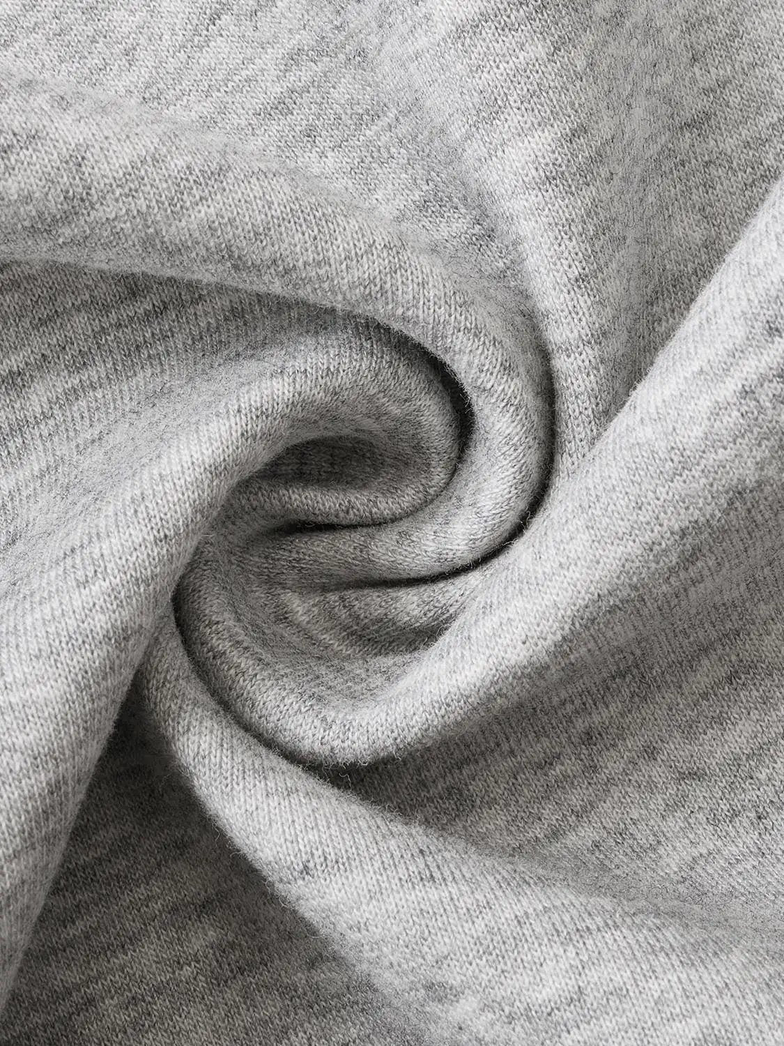 Sweatshirt jacket gray knit fabric with close-up texture.