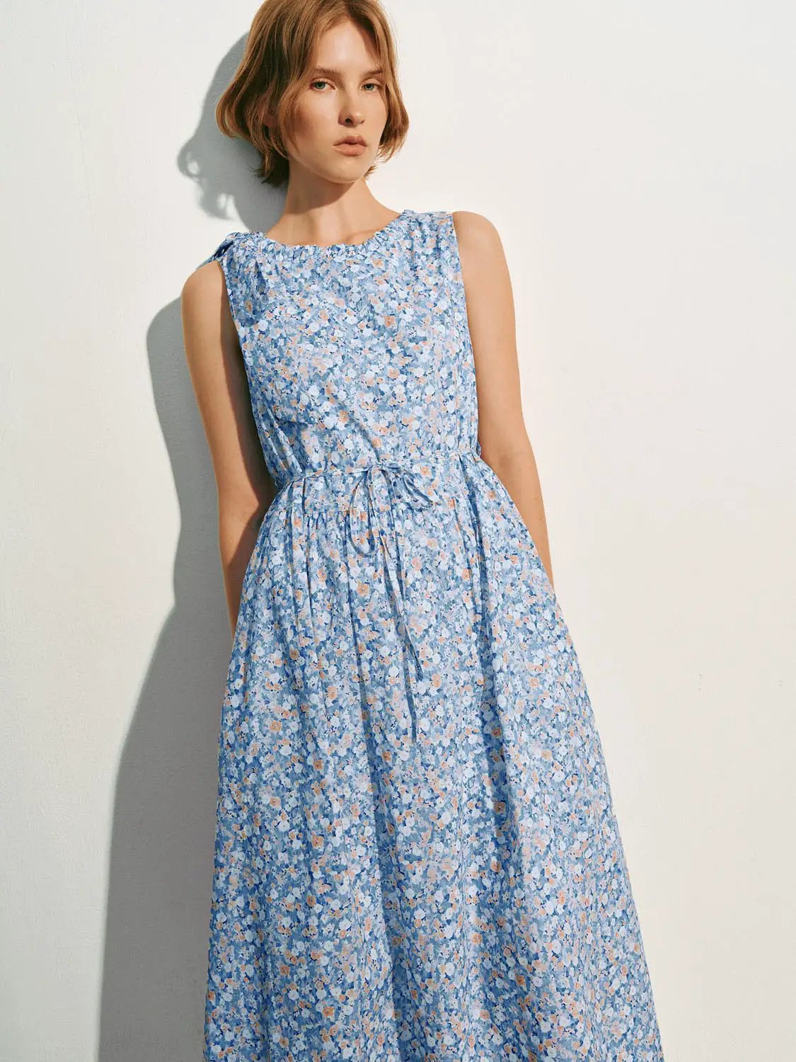 A-Line dress by Urban Revivo in blue floral print with a waist tie