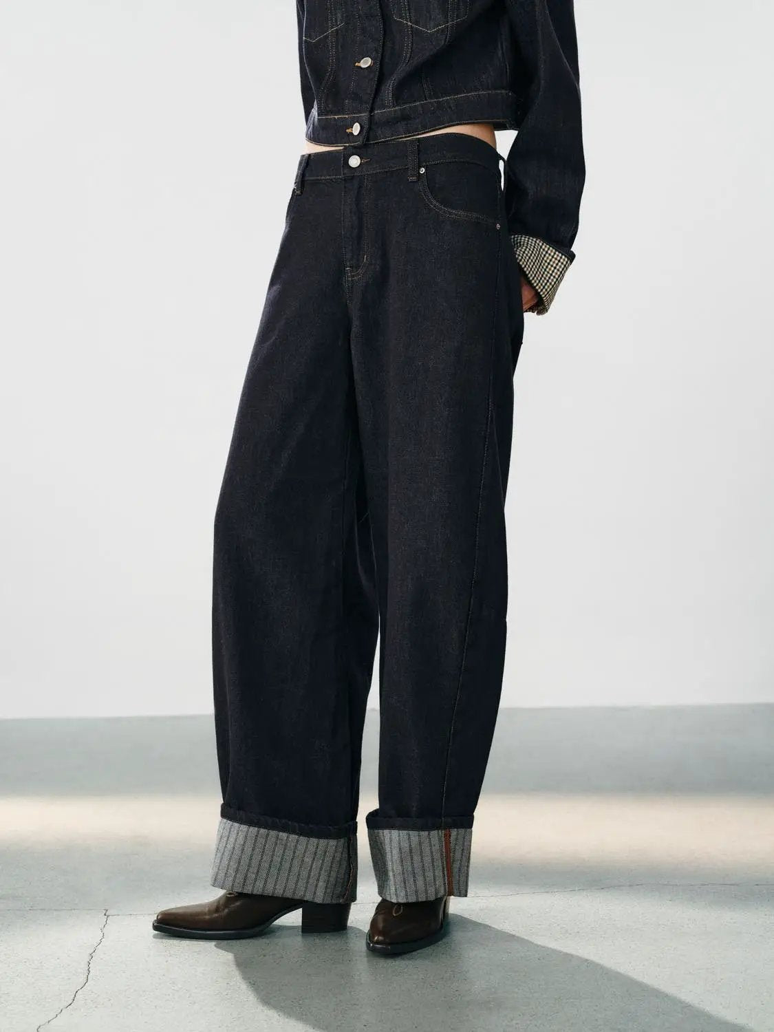 Jeans by Urban Revivo Fashion in dark denim with wide legs and rolled cuffs