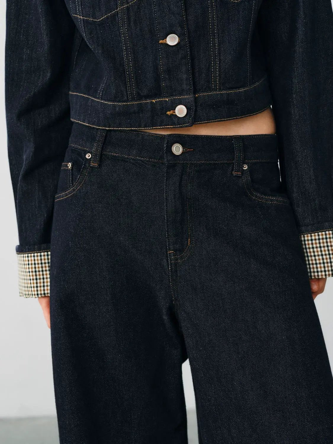Jeans Urban Revivo Fashion in dark indigo denim with copper stitching and metal button fly
