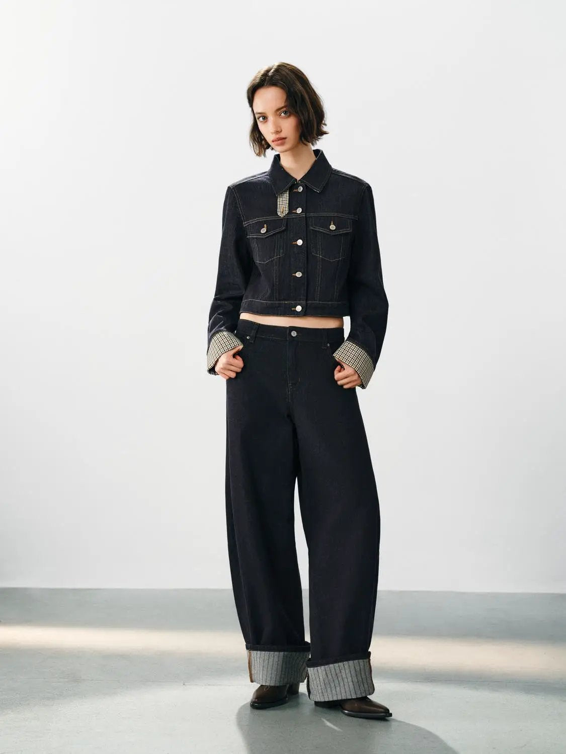 Jeans by Urban Revivo Fashion, dark indigo denim, wide-leg high-waisted with rolled cuffs showing light inner fabric