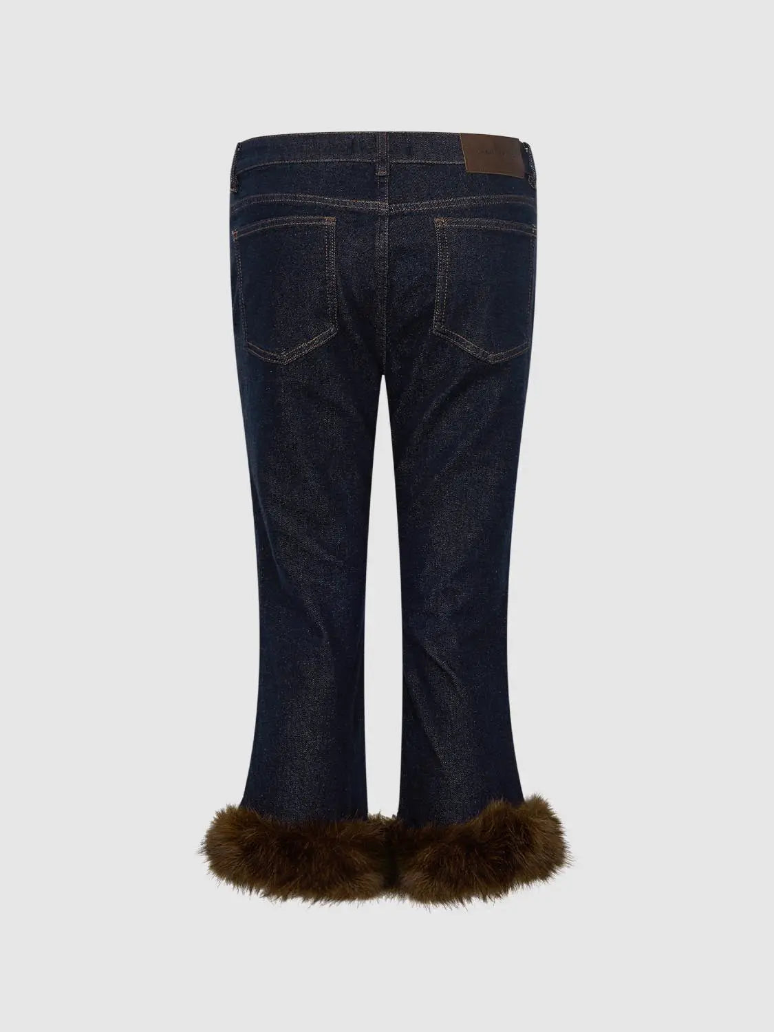 Jeans by Urban Revivo Fashion, dark denim with brown fur-trimmed cuffs, back view.